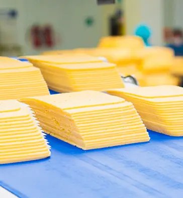 Stacks of sliced cheese